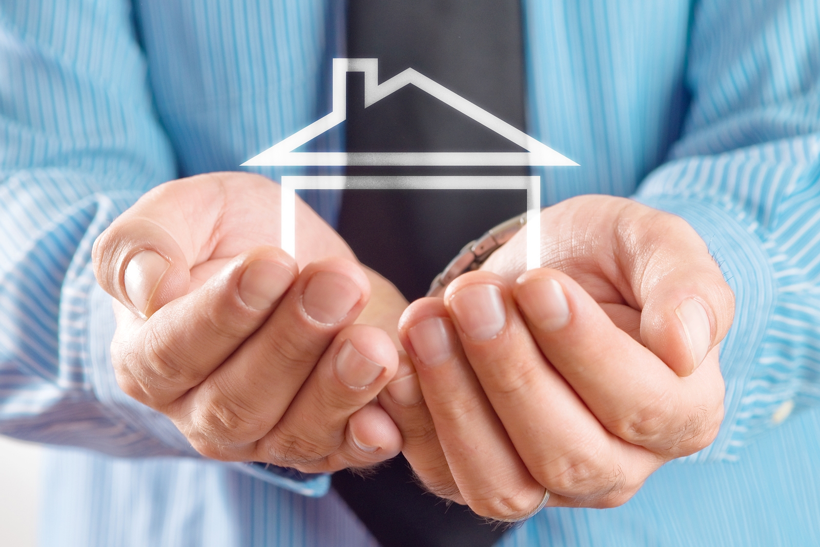 bigstock-House-In-Hands-Of-Businessman-45250603